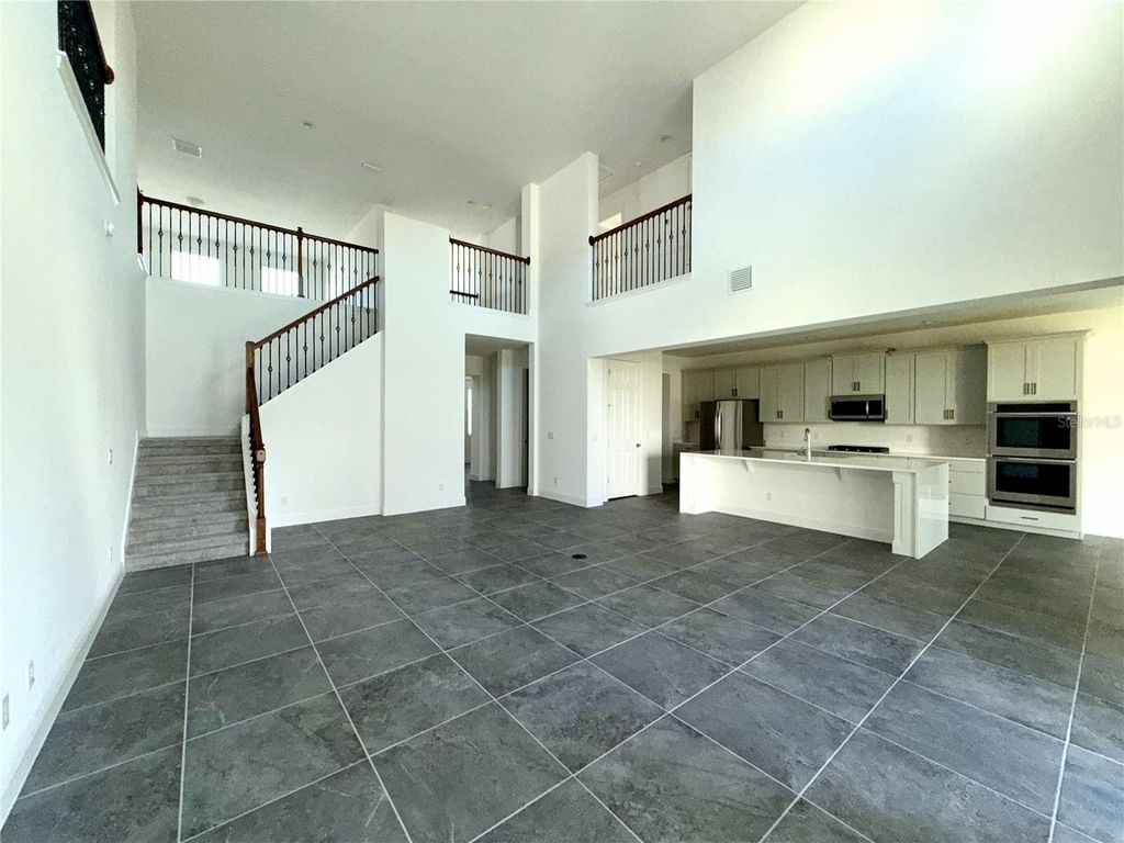 Photo of 394 Switchgrass Loop, Minneola, FL 34715 (MLS # O6363772)