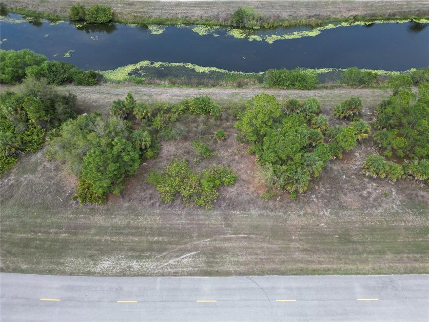 This WATERFRONT 0.27-acre vacant lot on Raintree Blvd offers a clean slate in one of Sarasota County’s fastest-growing cities. Located just minutes from I-75, the property provides easy access to Sarasota, Venice, Port Charlotte, and beyond—while still maintaining a quiet, residential feel. With no HOA and no deed restrictions, you have the freedom to design and build the home you actually want—whether that’s a primary residence, second home, or long-term investment. The surrounding area continues to see new construction, infrastructure growth, and expanding commercial development, making this a strategic location to buy and build. You’re also a short drive from Wellen Park, shopping, dining, parks, golf courses, and Gulf Coast beaches, offering both convenience and lifestyle appeal. For buyers looking to build, custom home-building guidance is available, including help navigating budgets, timelines, and design options. Whether you’re ready to build now or land-bank for the future, this lot delivers flexibility, location, and long-term upside.