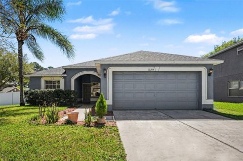 Photo of 12204 Luftburrow Ln, Hudson, FL 34669 (MLS # TB8488138)