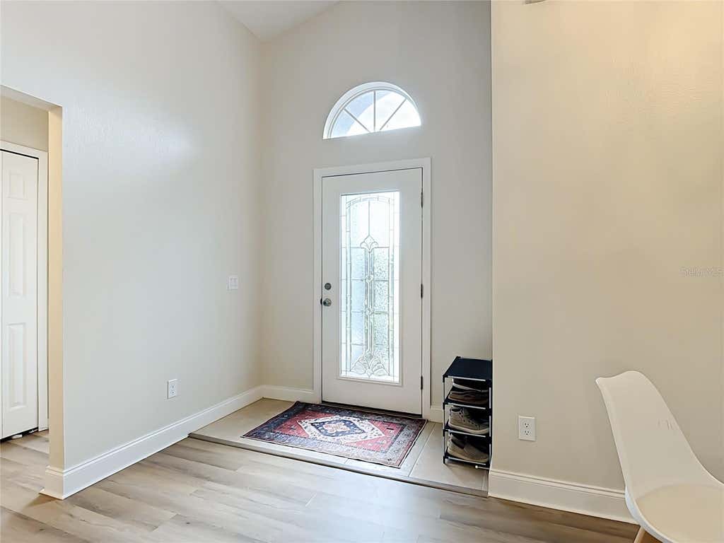 Photo of 1128 Pinedale Drive, Davenport, FL 33897 (MLS # O6433396)