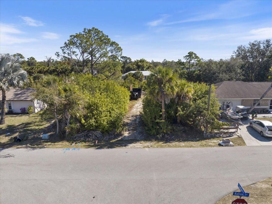 Gorgeous waterfront homesite with city water, situated in a well-established neighborhood with no HOA, no CDD fees, and no deed restrictions. Enjoy a prime location just minutes from I-75 and the shopping and dining options throughout North Port. Plus, you’re a short drive to some of Florida’s top beaches, championship golf courses, retail centers, and family-friendly attractions like the water park.