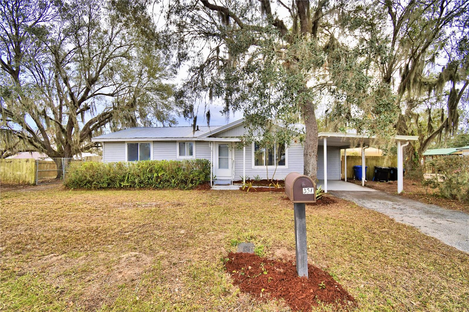 MOTIVATED SELLER!!!!Welcome home to this 3 bedroom 2 bath with central AC & Heat, one wall unit, car carport, extra parking, shed and nice size back screened porch. This home has beautiful oak trees, ornamental plants, double chain link gate on one side and single entry gate on the other side of the 6' wooden fenced back yard. When entering the home you notice a good sized living room and kitchen with dinette and French doors leading out to the screened porch. Off the dinette is a large 3rd bedroom with wall unit. Down the hall from the living room and kitchen is the master bedroom with ceiling fan and walk in closet and master bathroom with shower. 2nd bedroom has ceiling fan and built in closet. Guest bath is large with tub/shower combo, washer & dryer and hot water heater. Close to town, stores, schools, ball fields etc. this is such a sweet forever home. Don't miss out. Call for an appointment today to see this jewel. Walls have been cleaned as well as carpets.