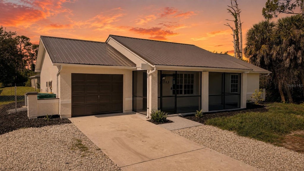 Photo of 18083 Regan Avenue, Port Charlotte, FL 33948 (MLS # A4696367)