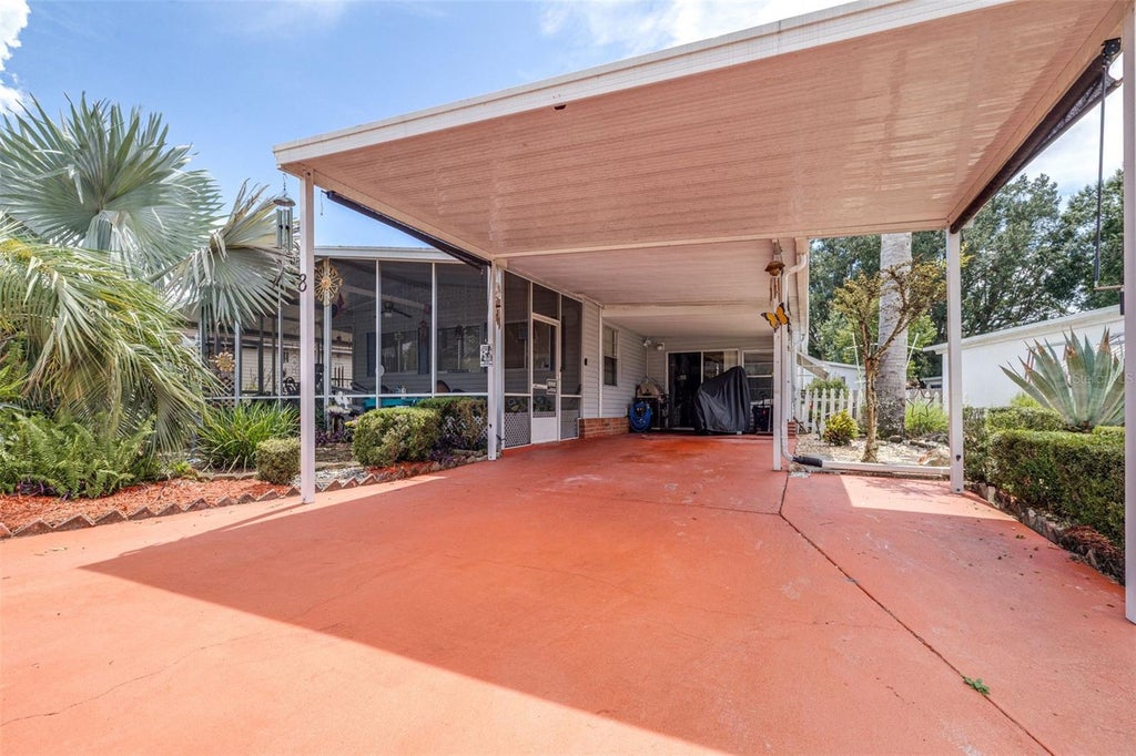 Photo of 8 Woodland Circle, Haines City, FL 33844 (MLS # L4965045)