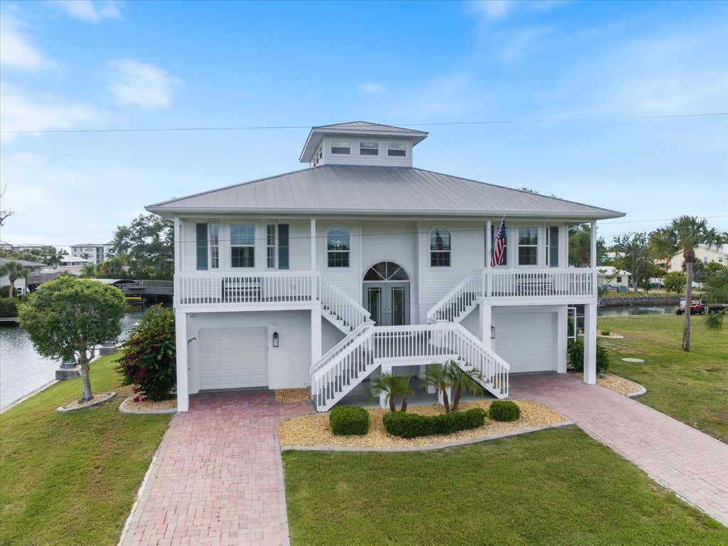 Photo of 9181 Lake Drive, Englewood, FL 34224 (MLS # D6148357)
