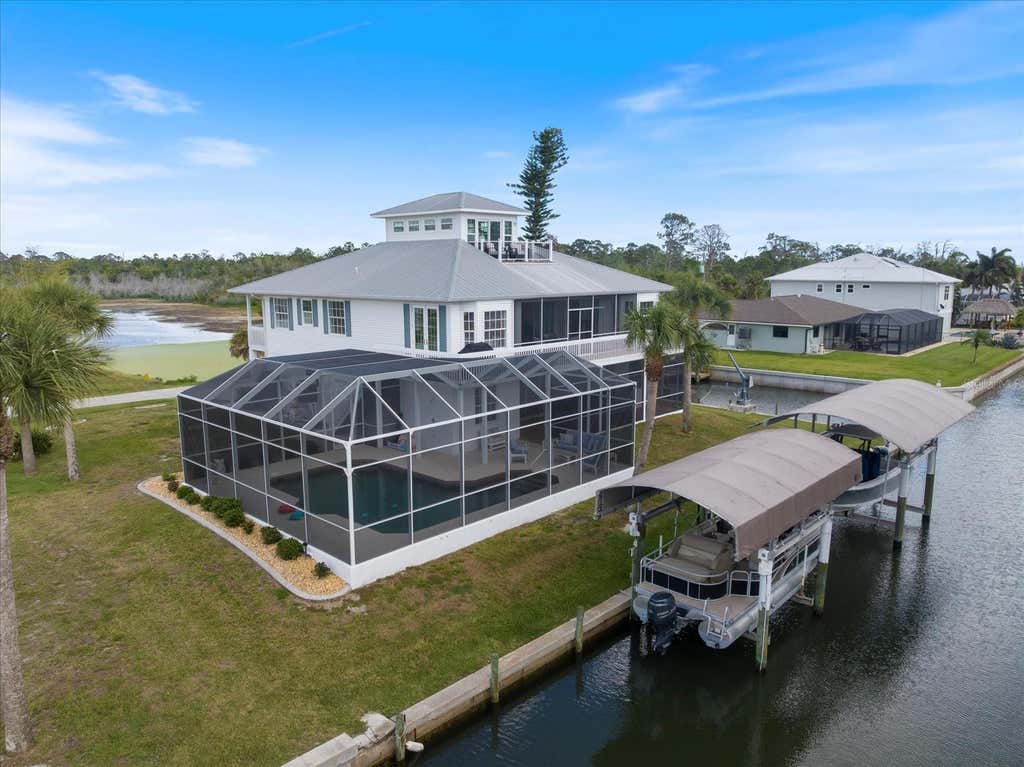 Photo of 9181 Lake Drive, Englewood, FL 34224 (MLS # D6148357)