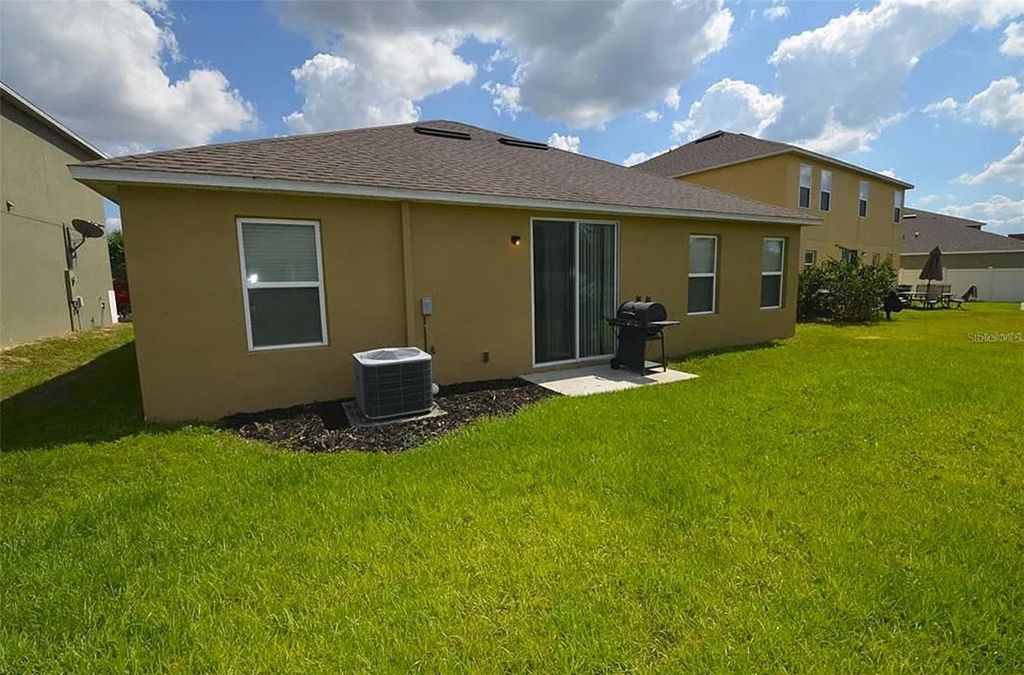 Photo of 16248 Saint Augustine Street, Clermont, FL 34714 (MLS # O6361586)