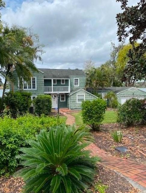 425 Alberta Drive is a Gamble Rogers-designed lakefront home with a boathouse built in 1938 that has not been registered historical and is being sold as is. Bring your builder to build your future home. The home itself has lots of character if you want to take on a project but the value is in the lot. Spectacular views, location is wonderful with brick street, mature landscaping and the backyard faces west for great sunsets. Take your boat through the chain of lakes and enjoy the boating lifestyle. Close to downtown Park Avenue with all the shops and dining.