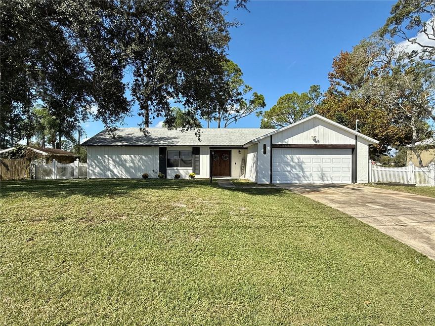 Welcome to your new home! This charming 3-bedroom, 2-bathroom home offers a comfortable split floor plan with a large living room and dining space. The layout is perfect for family time and entertaining! Step outside to a spacious back porch where you can relax and enjoy peaceful views of the lake. Nestled on a nice lot with plenty of room to play. This home offers the perfect blend of comfort, space and plenty of room for your family! Come see why you'll love living here! You don't want to miss this one!! HVAC 2024, Roof 2022