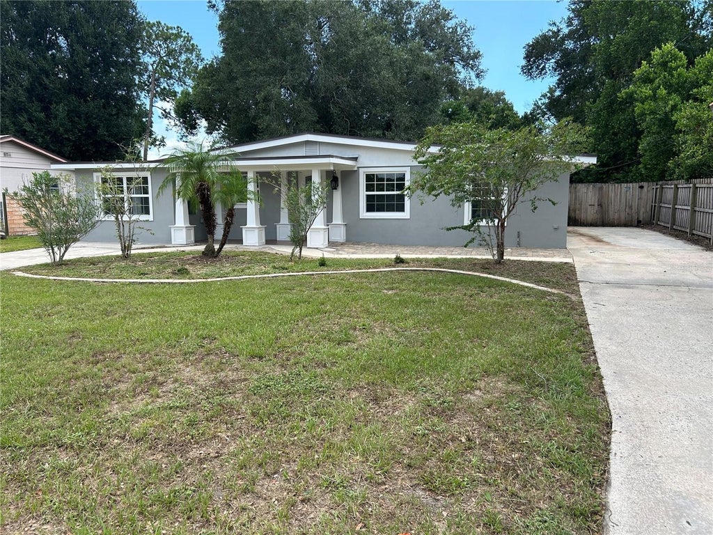 Photo of 104 E Gardenia Drive, Orange City, FL 32763 (MLS # V4950993)