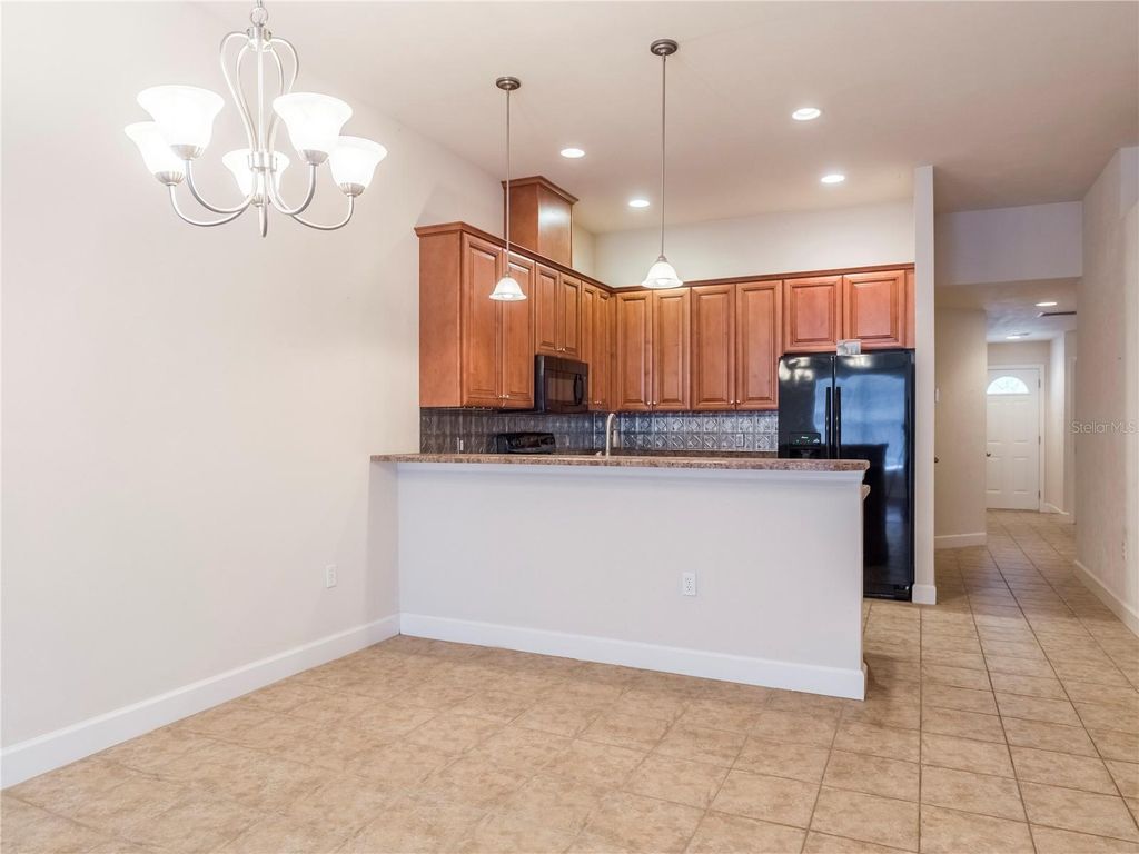 Photo of 10727 NW 65th Way, Alachua, FL 32615 (MLS # GC538889)