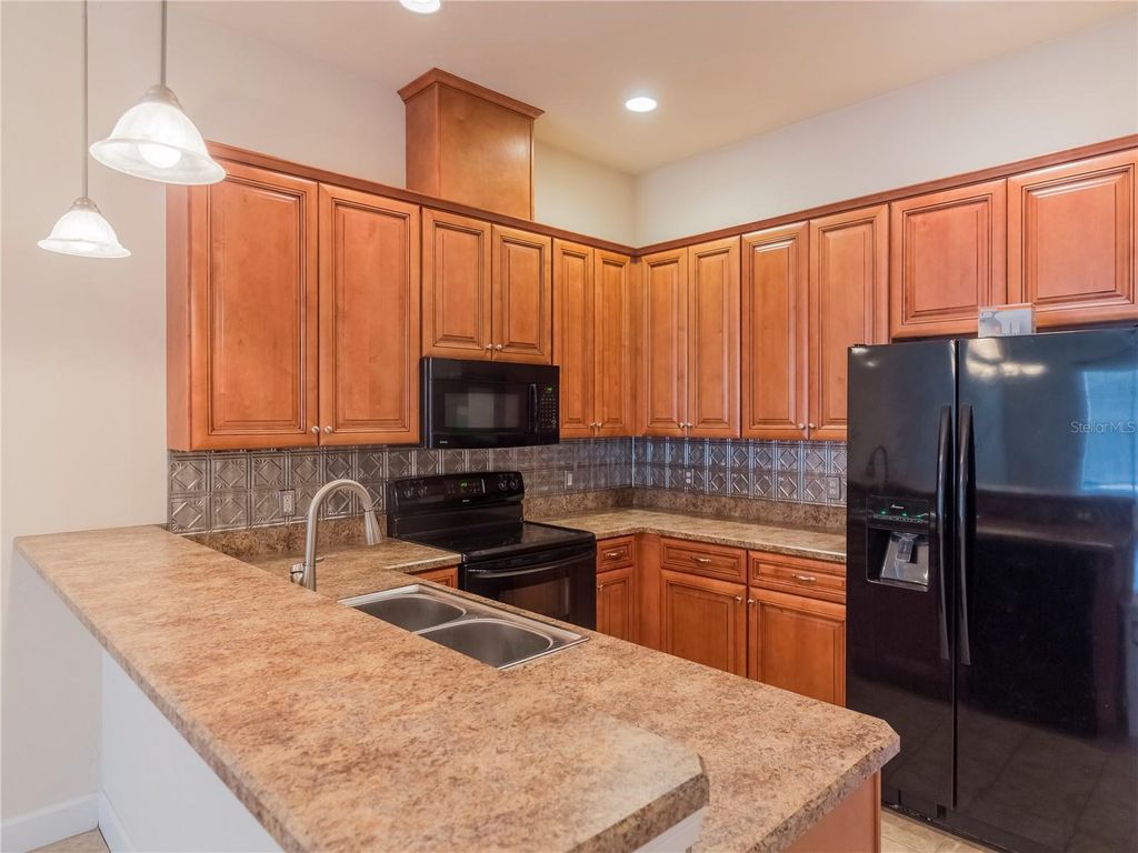 Photo of 10727 NW 65th Way, Alachua, FL 32615 (MLS # GC538889)