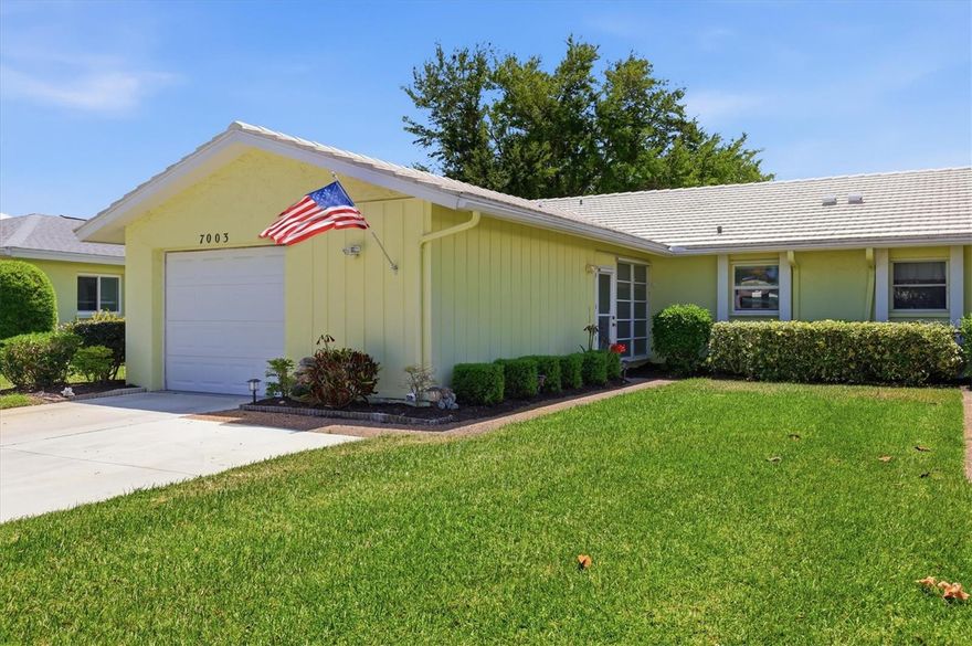 Welcome to your own slice of paradise…where it always feels like 5 o’clock! Located in Village Green, West Bradenton’s premier 55+ community, this move-in-ready 2-bedroom, 2-bath villa with a single-car garage offers the perfect blend of comfort and coastal charm making it ideal as a winter retreat or year-round residence. Throughout the home, you’ll find a coastal-inspired design that creates a relaxed, island-style atmosphere making every day feel like a vacation. The beautifully updated kitchen features white shaker cabinets, glass tile backsplash, and stainless steel appliances. Both bathrooms have been thoughtfully renovated with new tile, glass shower doors, comfort-height vanities, updated mirrors, and modern lighting. The bright and sunny Florida room provides additional living space and is perfect for morning coffee, casual dining, relaxing with a good book, or unwinding with an evening cocktail. Additional features include luxury vinyl plank flooring in the main living areas, newer windows, raised panel doors, updated trim work, and more. Beyond the home, enjoy beautifully maintained grounds and a community heated pool with new pavers just steps away. Whether you’re seeking a full-time residence or seasonal escape, this villa offers an exceptional opportunity to embrace the Florida lifestyle in a peaceful, welcoming setting. All of this is just minutes from world-famous Gulf beaches, shopping, dining, churches, premier medical facilities, Robinson Preserve, and offers easy access to Sarasota and beyond. The location truly can’t be beat.