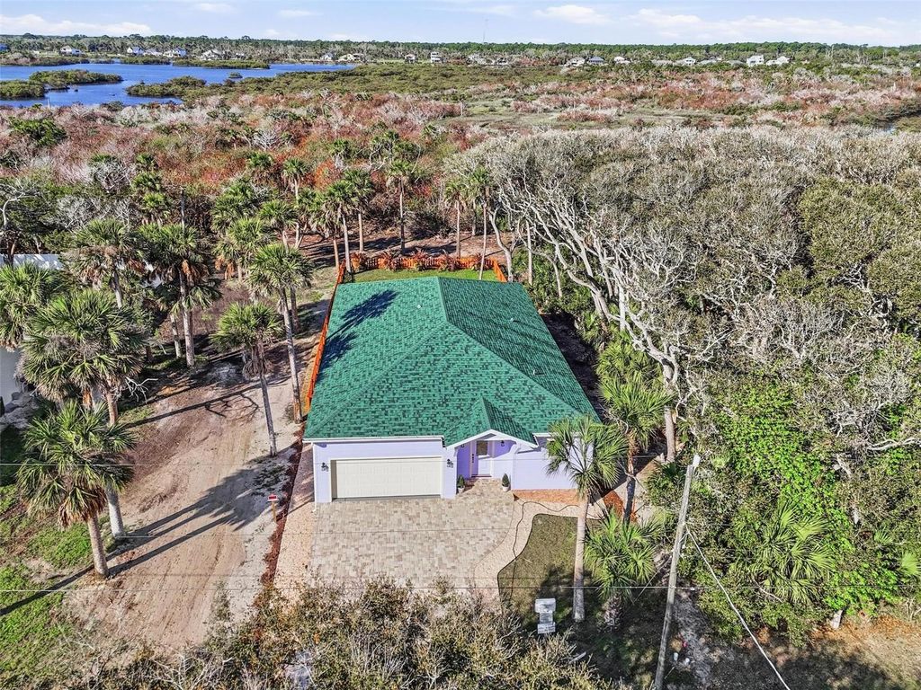 Photo of 1232 S Flagler Avenue, Flagler Beach, FL 32136 (MLS # FC316866)