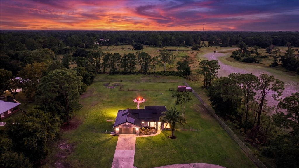 Photo of 3934 Burkholm Road, Mims, FL 32754 (MLS # O6437373)