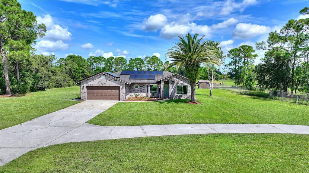 Photo of 3934 Burkholm Road, Mims, FL 32754 (MLS # O6437373)