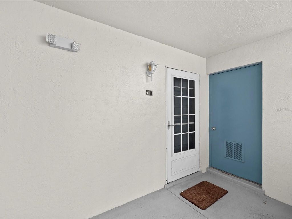 Photo of 2737 Enterprise Road E #111, Clearwater, FL 33759 (MLS # TB8460543)