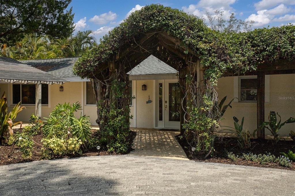 MOTIVATED SELLER SAYS "BRING OFFERS" INVESTOR OPPORTUNITY! BUILD YOUR DREAM HOME or enjoy this well maintained home.
BEST PRICE CANAL FRONT with great rental income. Estate sized parcel of 13,200 sq ft, located on sought after North end of the Island. Only steps to the beach and Pine Ave boutique shops, restaurants and more.
This 3-bedroom home, 3 full bath home, is hidden away on a quiet cull de sac, just a short stroll to the sparkling white sands of the beach. TURN-KEY FURNISHED for immediate rental. (List of Reservations attached ) Stroll down to your DOCK and kayak or boat within minutes to the turquoise waters of the Gulf of Mexico. The home boasts over 127 feet of sheltered mangrove waterway. Professionally landscaping enhanced by shady pergolas wrapped in fragrant jasmine’.
At almost 2000 sq ft, the home offers a split plan with three bathrooms en suite, a generously proportioned master with French doors opening to the pool (as does the second bedroom) and a large skylit bathroom. Beautiful Italian ceramic tile runs throughout the house. Striking kitchen remodel 2022 with all new stanless appliances and granite countertops. Dine poolside or in the glass enclosed dining room overlooking the pool and garden. In addition there is a seperate building housing a GIANT 900 sq. ft garage with room for 3 cars, Golf Cart and all your toys. Poolside are shower and additional laundry room/storage area. See rental bookings attached.