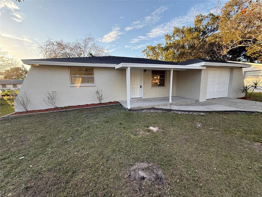 Solid block home with fenced backyard, 2 bedrooms, 1.5 bathrooms, 1 car garage. Interior and exterior just painted. New vinyl plank floors just installed in the living room & bedrooms. In addition, both bathrooms had tile floors installed and a new rear slider and garage door was installed. The backyard has a shed and screen lanai. The 1-car garage is oversized and has room for washer and dryer hook-up. This home features newer 2.5 ton AC unit & shingle roof replaced in summer of 2024. Kitchen cabinets and counters replaced in 2016. There are no HOA or CDD fees. Located in the city of Zephyrhills and close to shopping, dining, hospitals. A short commute to theme parks, shopping malls, beaches and much more. Hurry, this one won't last long!!