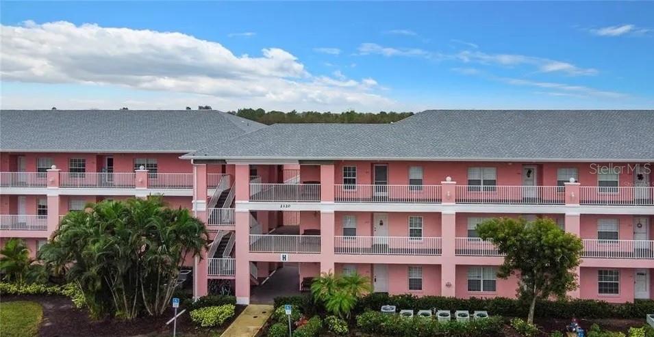 Annual Unfurnished Rental 2 Bedroom, 2 Bathroom Condo in Gated Community! Live in the desirable Heritage Lake Park community, nestled in the Deep Creek area of Punta Gorda. This unit offers two bedrooms and two bathrooms, located on the second floor of a well-maintained, three-story building with convenient elevator access. The home features a peaceful pond view, a fully equipped kitchen with new stainless-steel appliances, a new vinyl flooring, new ceiling fans and Light Fixtures, window treatments, an in-unit washer and dryer, and one designated parking spot under a carport and if a second spot is needed guess spots area available. Heritage Lake Park is a gated community that offers exceptional amenities including a swimming pool, tennis/pickle courts, a fitness center, a large clubhouse w/ Library & Pool Table, walking paths, and beautifully landscaped grounds with secure entry. No pets and no smoking are permitted.