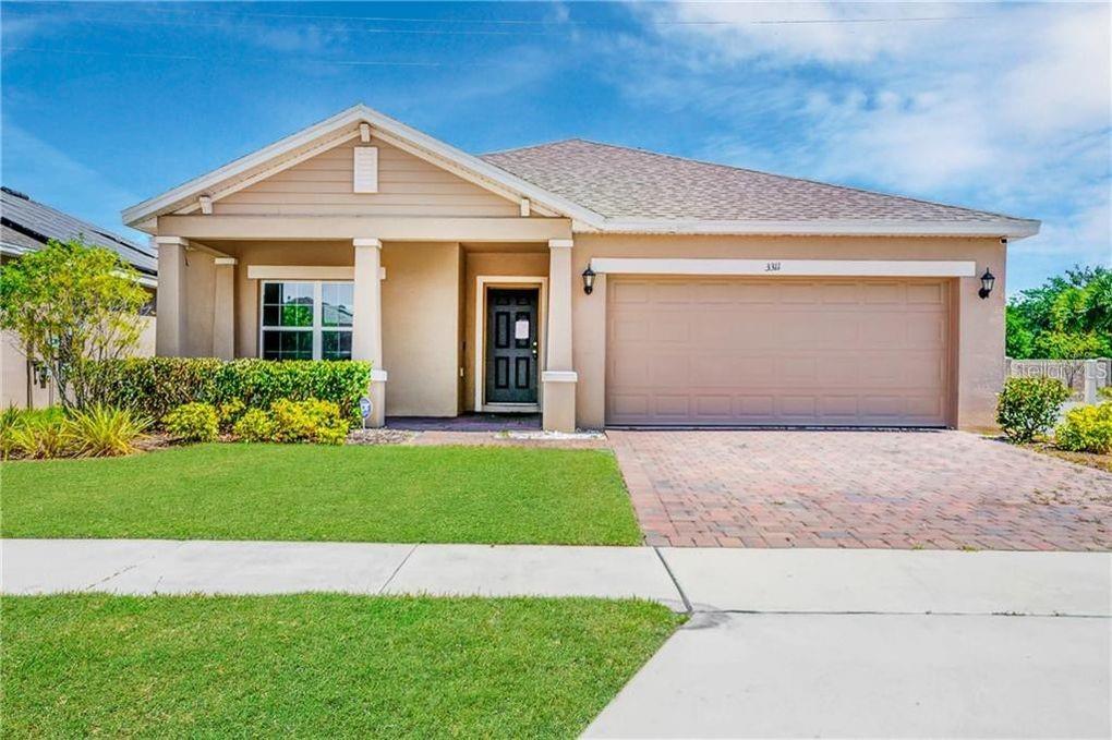 Freshly painted with new flooring. Amazing 4 bedroom, 3 bathroom home in Kissimmee for rent. Amenities include: central air, central heat, washer dryer, stainless steel appliances, updated kitchen, updated bathrooms, yard, and community pool. Two master bedrooms.