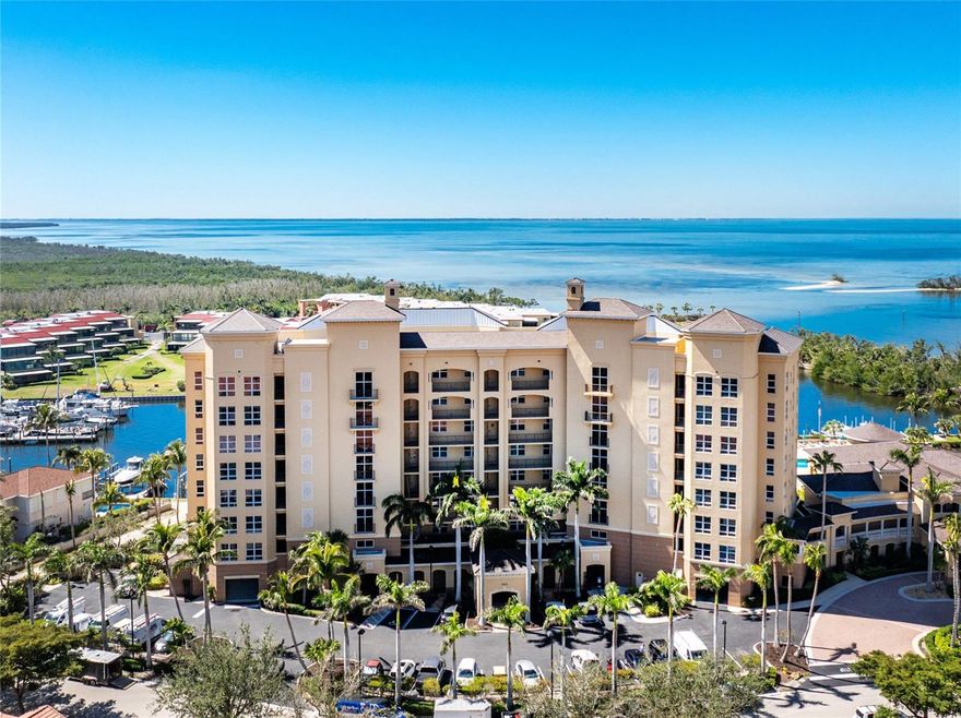 SEASONAL RENTAL-Exquisite End-Unit Penthouse at Grand Isle Towers – Panoramic Waterfront Luxury
Perched gracefully on the southernmost corner of the top floor, this turnkey furnished penthouse residence at Grand Isle Towers offers an unparalleled vantage point overlooking the marina channel entrance, Charlotte Harbor, and the South Marina Basin. With nearly 2,500 sq ft under air, every detail of this home has been curated to embody elegance, comfort, and timeless coastal sophistication.
The interior is bathed in natural light through walls of glass and soaring volume ceilings, framing panoramic water views that captivate from nearly every room. The heart of the home is the strikingly modern kitchen, where a sprawling quartz surface crowns custom Amish cabinetry, accented by gold-tone hardware for a refined finish. Designed for both beauty and function, the kitchen also features a large breakfast bar, expansive granite counters, abundant storage, and Whirlpool stainless steel appliances, making it a dream space for both casual dining and entertaining.
The residence is impeccably furnished with high-end coastal décor, ensuring a seamless and luxurious living experience from the moment you arrive.
Beyond your private retreat, Grand Isle Towers offers resort-style amenities that rival any luxury destination: a private fitness center, intimate theater room, elegant grand salon, and an expansive waterfront deck with an Olympic-size geo-thermal heated pool, spa, and grilling area.
Life at Burnt Store Marina enhances this lifestyle even further, with two on-site restaurants, a 27-hole championship golf course, active pickleball and tennis groups, a modern fitness center, and the largest deepwater marina in Southwest Florida—a true haven for boaters.
This penthouse is more than a home; it is a statement of refined living where waterfront beauty, luxury amenities, and the vibrant Burnt Store Marina lifestyle converge in perfect harmony.