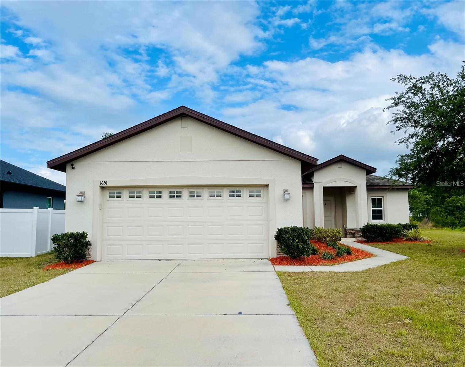 $2,300 Per month 3 bed 2 bath home built in 2018, no rear neighbors with a view of the lake. Enjoy this perfect fairly new home with laminate floors, spacious kitchen, nook and large living room, huge master bedroom that fits a king size bed. This home is located minutes from the turnpike or lake nona area and minutes to shopping areas and the hospital. Small community with well taken care of homes located on a cul de sac with no traffic flowing through the community. Extra long driveway that will hold a number of cars as well as the 2 car garage, Hurry as this will lease fast