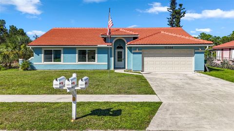Photo of 13384 Darnell Avenue, Port Charlotte, FL 33981 (MLS # A4668592)