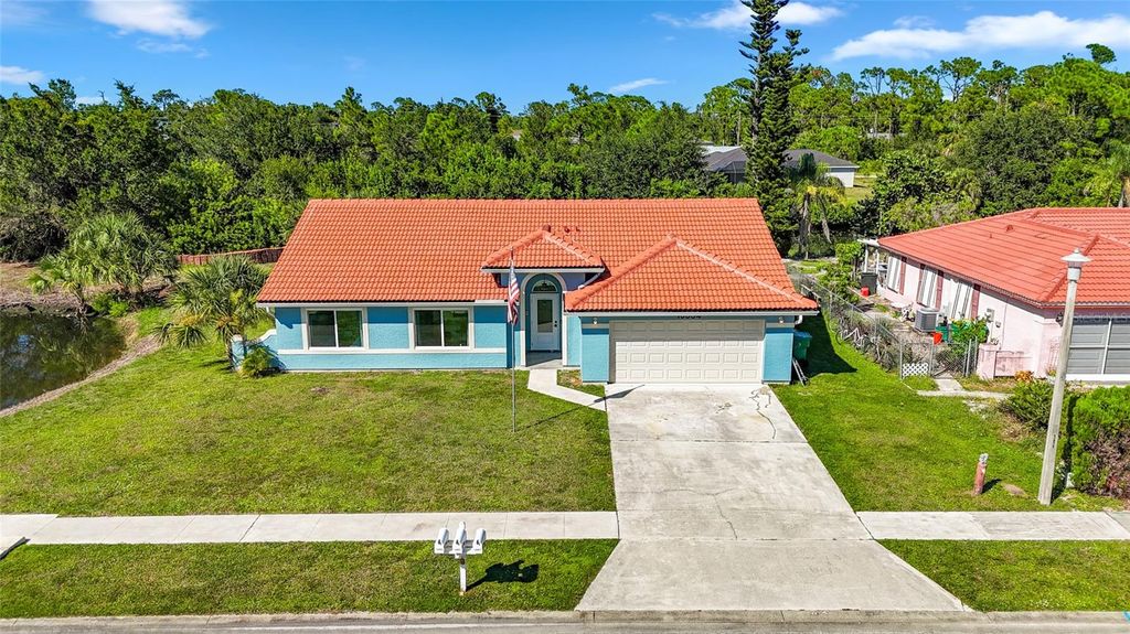 Photo of 13384 Darnell Avenue, Port Charlotte, FL 33981 (MLS # A4668592)