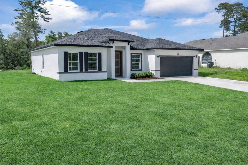 Photo of 3211 SW 128th Street Road, Ocala, FL 34473 (MLS # O6313421)