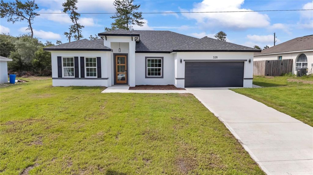 Photo of 3211 SW 128th Street Road, Ocala, FL 34473 (MLS # O6313421)