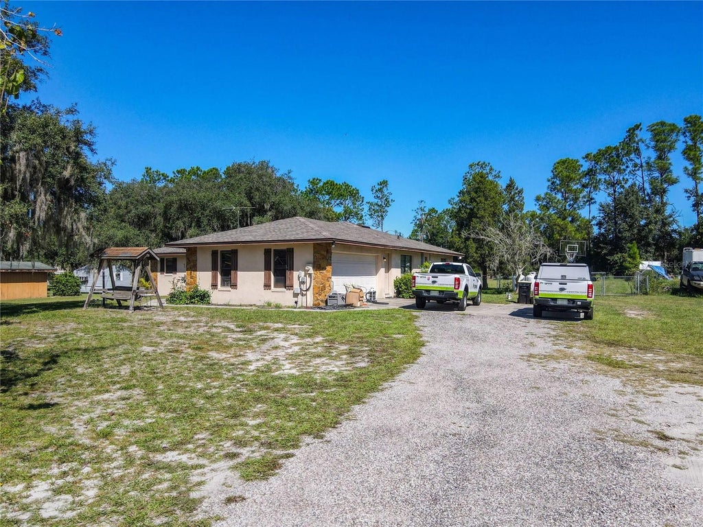 Photo of 122 Wgto Tower Road, Lake Alfred, FL 33850 (MLS # O6445599)