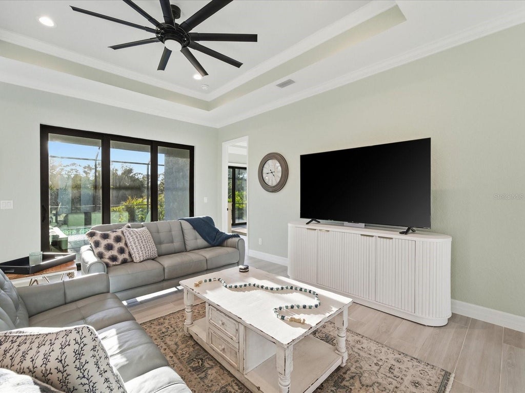 Photo of 149 Long Meadow Lane, Rotonda West, FL 33947 (MLS # C7532718)