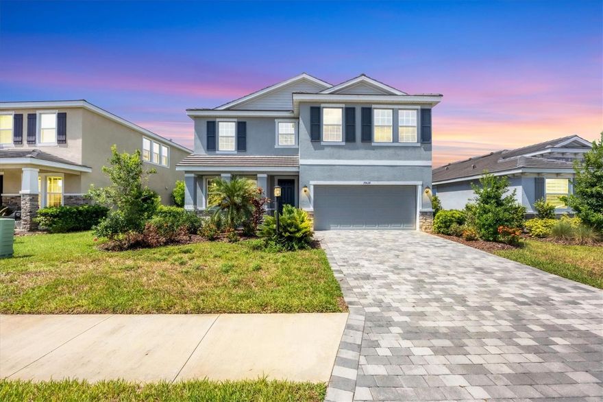 STAR FARMS in Lakewood Ranch where resort-style living awaits in this exceptional 4-bedroom, 3-bath home with additional den and large bonus room on an expansive lakefront homesite featuring 2,756 sq ft of thoughtfully designed space. This Caroline Emerald model includes a versatile 20x11 bonus room with a closet, ideal for a media lounge, playroom, or private guest retreat, plus a separate main level den/office for added flexibility. The open-concept layout showcases tile flooring in the main living areas and plush carpeting in the bedrooms, creating a warm and inviting atmosphere throughout. The gourmet kitchen is a chef’s dream, featuring upgraded black stainless steel appliances, a gas range, and a large center island perfect for entertaining. The home also includes a washer and dryer, two walk-in closets in the primary suite, and Southwestern exposure that fills the space with natural light. Step outside to enjoy the extended, covered paver lanai overlooking a tranquil water view—fully fenced for privacy and ideal for relaxing or hosting gatherings. An EV charger is installed and ready to use, adding convenience for eco-conscious living. Star Farms offers an unparalleled lifestyle with exclusive amenities such as a resort-style pool with tiki bar/restaurant, coffee house, clubhouse, state-of-the-art fitness center, pickleball and tennis courts, basketball court, baseball diamond, playground, park, and scenic walking trails. Zoned for the BRAND NEW LAKE MANATEE SCHOOL with additional A rated schools nearby. Located just a short drive from Lakewood Ranch Main Street, Waterside Place with a variety of shopping and dining options  plus easy access to Gulf Coast beaches, cultural attractions, and a vibrant mix of dining and shopping. This home includes professional lawn care and one pet may be considered.