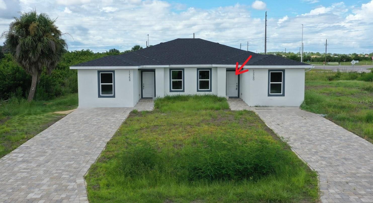 ANNUAL RENTAL in Port Charlotte. New Construction - 1/2 DUPLEX - Never Lived In. 3 Bedroom 2 Bath with NO HOA, NO Deed Restrictions, and NOT in a Flood Zone. Built in 2025, this unit offers 1162 sq of Living Space and wood look Luxury Vinyl Flooring throughout. Great Room with slider access to the Coved Lanai. Kitchen with White Shaker Cabinets, Stainless Appliances, a Breakfast Bar plus a Dinette. The Primary Bedroom has a Walk-in Closet & an Ensuite Bathroom and there are 2 additional nice-sized Bedrooms and a 2nd Bathroom for your Family & Friends. Convenient Inside Laundry Closet with Washer/Dryer Hookups. Located in a Quiet neighborhood next to a Golf Course, and just minutes to Boca Grande and Manasota Key. Enjoy Boating, Fishing, Kayaking, Golf, Tennis, Pickleball, Bike Trails, Arts, Entertainment, Local Farmers Markets, and Beautiful Gulf Beaches. Make your appt to view this property TODAY!