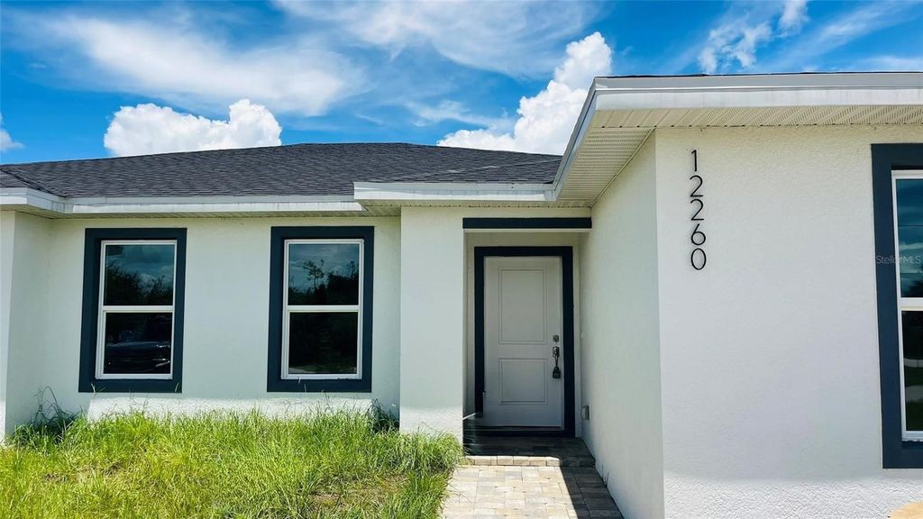 Photo of 12258 Henley Avenue #B, Port Charlotte, FL 33981 (MLS # C7514301)