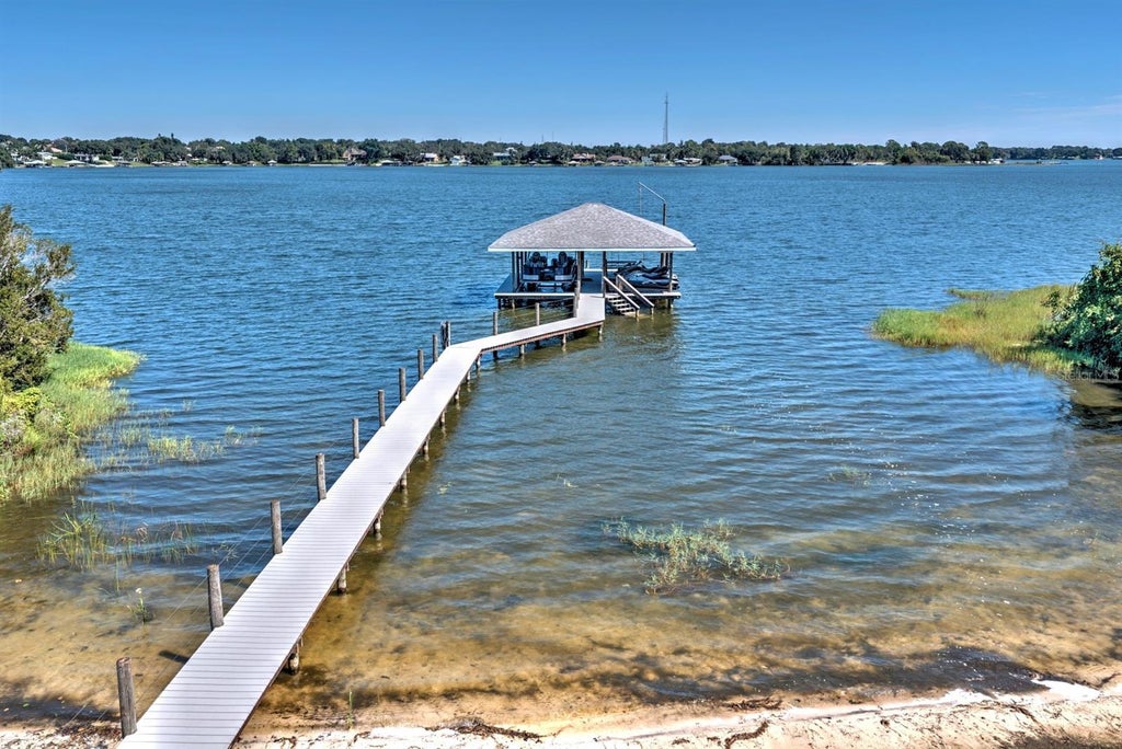 Photo of 492 Sunset Pointe Drive, Lake Placid, FL 33852 (MLS # P4940213)