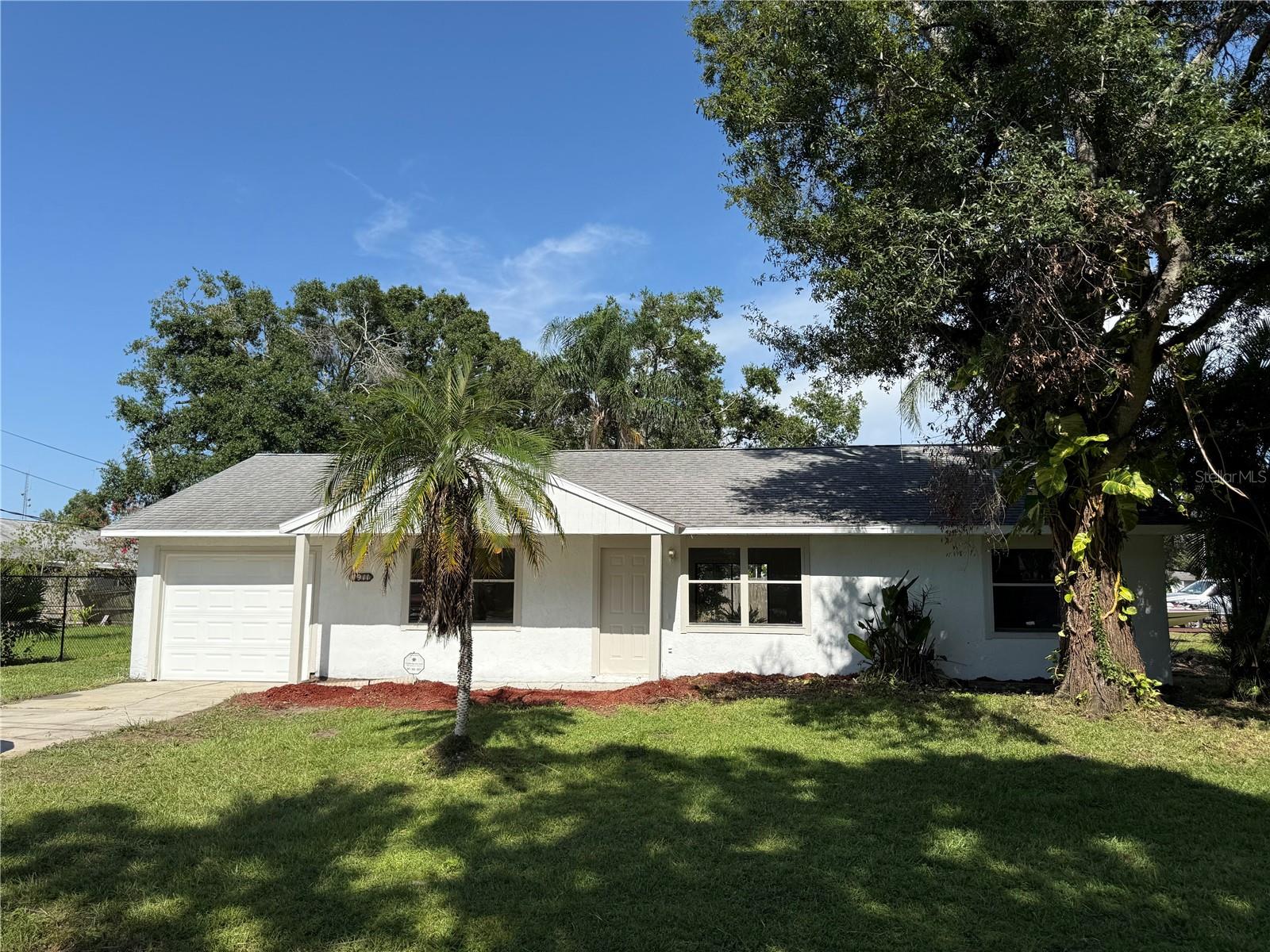CHARMING 3 BEDROOM, 2 BATH HOME LOCATED ON A SLIGHTLY LARGER CORNER LOT IN A QUIET, ESTABLISHED QUIET NEIGHBORHOOD. THIS SINGLE-FAMILY RESIDENCE SITS ON A SPACIOUS LARGER CORNER LOT WITH MATURE TREES AND PLENTY OF ROOM TO EXPAND OR ADD OUTDOOR AMENITIES. THE HOME FEATURES A FUNCTIONAL LAYOUT, ATTACHED ONE-CAR GARAGE, CENTRAL A/C, AND A GENEROUS YARD—PERFECT FOR FAMILIES OR INVESTORS. MINUTES FROM IMG SCHOOL, SW FLORIDA COLLEGE AND THE BEAUTIFUL ANNA MARIA BEACH. NO HOA OR DEED RESTRICTIONS. MINUTES FROM SHOPS, RESTAURANTS, AND MAJOR ROADS.THIS PROPERTY IS NOT ON A FLOOD ZONE. SOLD AS-IS. PROPERTY QUALIFIES FOR VARIOUS DOWN PAYMENT COUNTY ASSISTANCE.