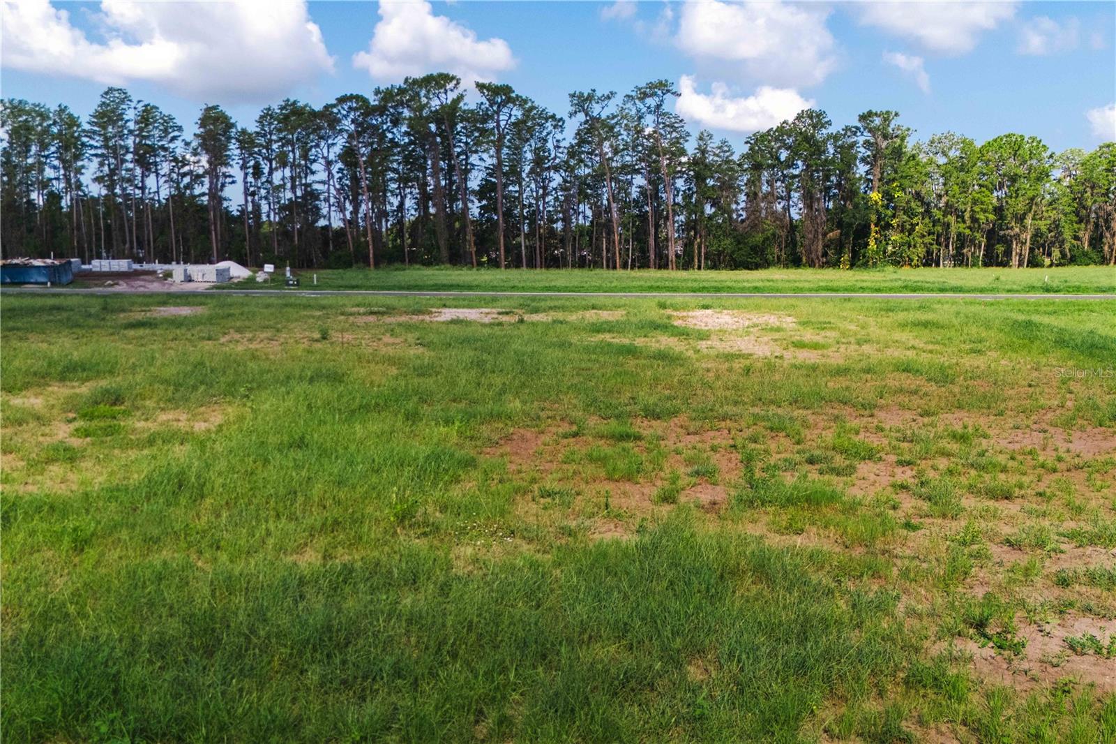 Welcome to Odessa Preserve! Encompassing approximately 50 acres in beautiful Odessa, Florida, this prestigious, gated development is where luxury meets resilience and sustainability. Featuring both inland and direct lakefront lots, each of the 1-plus acre parcels will have private access to beautiful, freshwater, 19-acre Lake Artillery. Allow our developer to build one of four truly unique, contemporary estates or use an authorized builder to build the custom home of your dreams. With four models currently under construction, each property will include high-end packages such as whole-house gas generators, custom designer interiors, hidden closets, wine rooms, dedicated gardens, private outdoor showers and four-car garage options, just to name a few. Each model embodies outdoor living at its finest with expansive cabanas, lanais and top-of-the-line outdoor kitchens — beautiful, tranquil spaces for relaxing and entertaining. Call one of our dedicated advisors today to set up a private tour of Odessa Preserve and don’t miss out on this fantastic opportunity for a few discerning buyers who are seeking a lifestyle with unparalleled comfort, privacy and style!