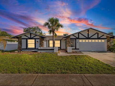 Photo of 6907 Bottle Brush Drive, Port Richey, FL 34668 (MLS # TB8545877)