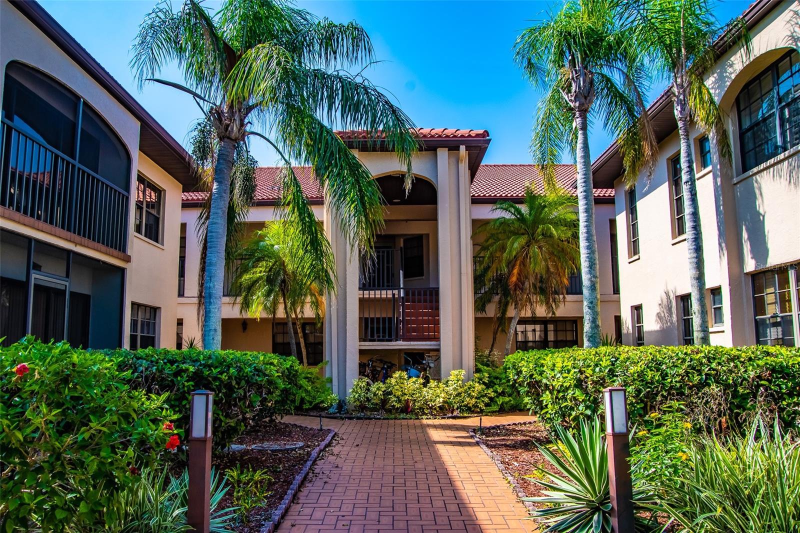 First-Floor End Unit in Rolls Landing
Welcome to this desirable 2-bedroom, 2-bath condo in the waterfront community of Rolls Landing. This spacious end unit on the first floor features 2 bedroom and two baths, newer luxury vinyl flooring and an open layout with a generous-sized living room filled with natural light. The large kitchen offers a convenient breakfast bar, while the master suite boasts a newly updated shower for modern comfort. From the back of the condo, enjoy peaceful views of the pond and fountain from your sliders that open onto a mini porch. There is covered parking right out front and additional parking for your guests.
Rolls Landing is nestled along the Peace River and provides an incredible lifestyle with amenities including a heated pool and spa, tennis and pickleball courts, shuffleboard, bocce ball, community center with grilling areas, walking paths, and a fishing pier. For boating enthusiasts, dockage may be available when slips are sold by owners, plus there’s a kayak launch and trailer storage. This gated community with 24-hour security offers peace of mind and resort-style living.