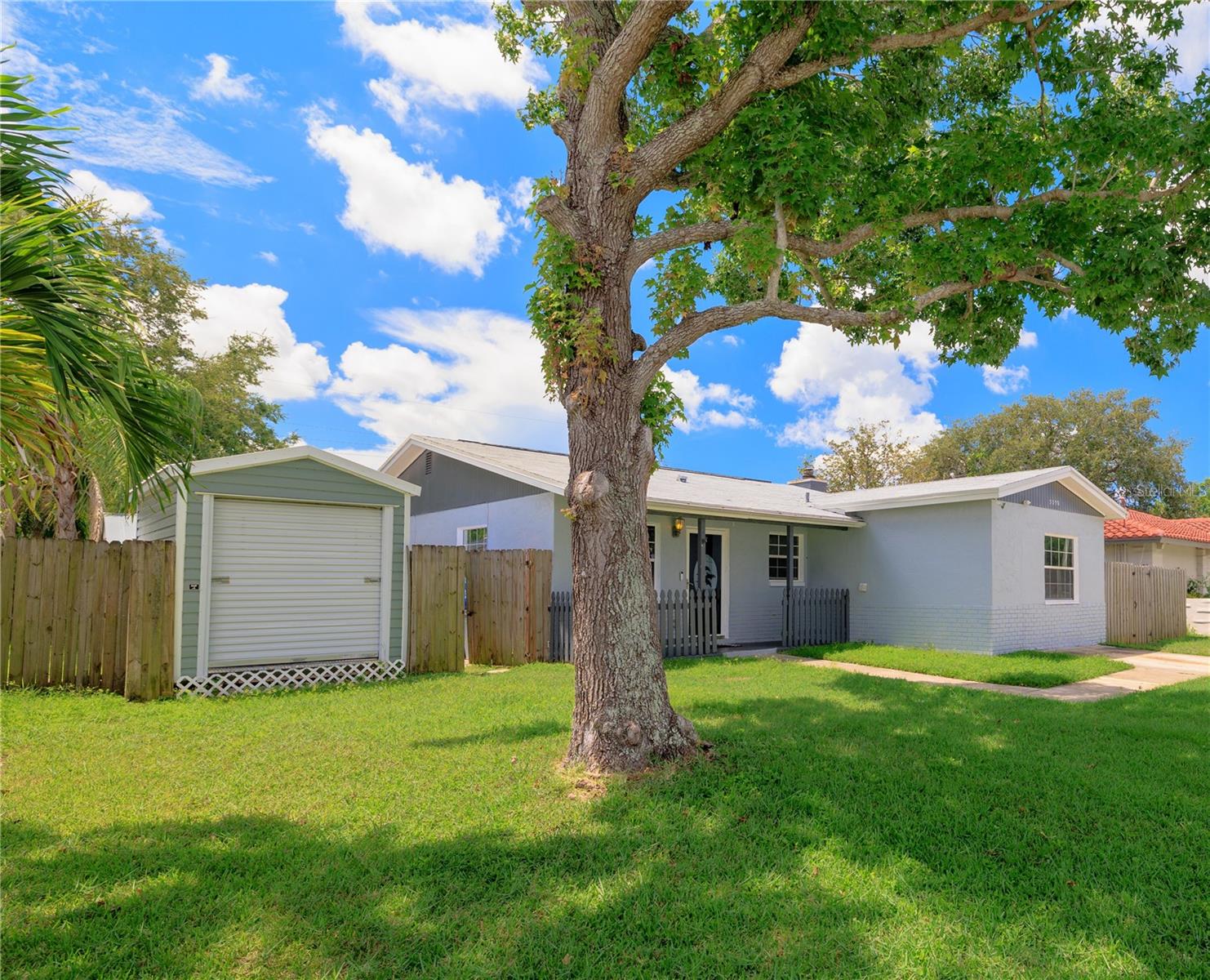 Welcome to this 3-bedroom, 2-bath block home in the heart of Pinellas Park, offering over 1,600 sq. ft. of living space including a versatile bonus room and sunroom. As you enter through the front door, you’re greeted by a beautiful kitchen with a built-in workspace, perfect for cooking and staying organized. The living area features a cozy fireplace, while the large bonus room and sunroom provide flexible space for a home office, playroom, or extra living area. Outdoors, enjoy the in-ground pool and low-maintenance yard, ideal for Florida living. The property also includes three storage sheds, with the main oversized shed (nearly the size of a one-car garage) conveniently accessible from the front yard. Additional updates include all new plumbing throughout, solar panels and roof for energy efficiency and long-term savings. This home has been lovingly cared for and is ready for its next chapter. Conveniently located near shopping, dining, and just a short drive to the beaches, downtown St. Pete, and Tampa International Airport, this home offers both comfort and convenience.