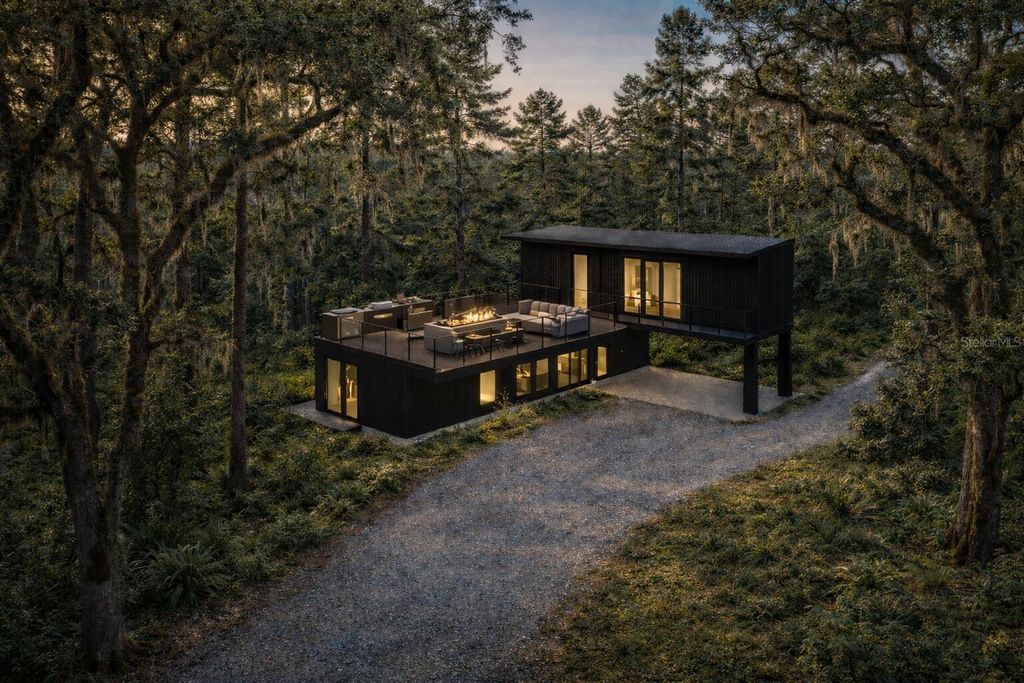 Photo of 936 Paradise Boulevard, Georgetown, FL 32139 (MLS # O6388645)