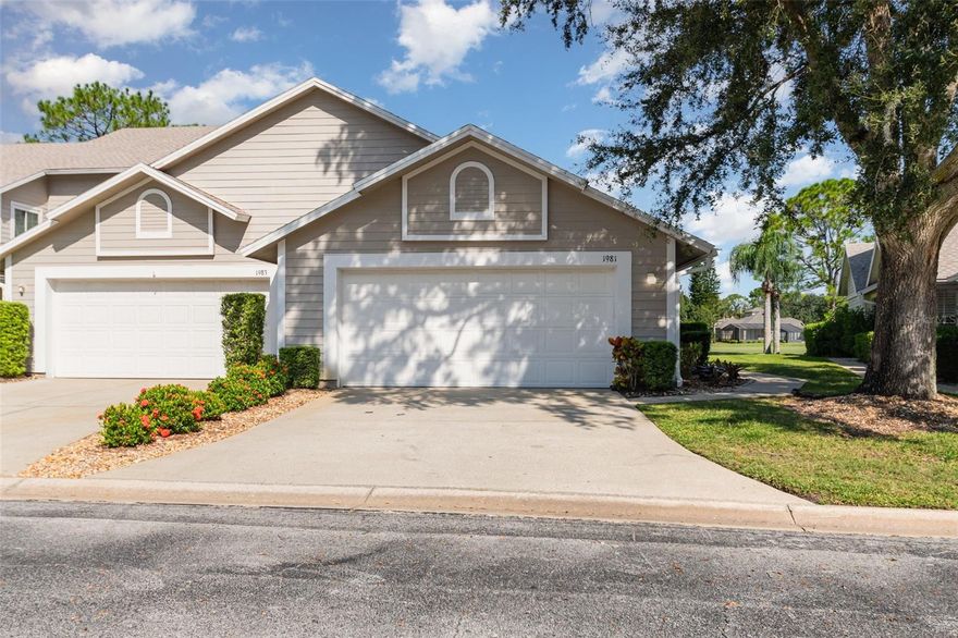 One or more photo(s) has been virtually staged. This end-unit villa condominium offers scenic golf course views in the guard-gated community of Spruce Creek Fly-In. Spacious and bright, the home has a welcoming entry foyer that flows into a great room with a high ceiling and skylights, along with a connected climate-controlled Florida room with a door that opens to a paver patio. A convenient pass-through counter joins the great room to the well-equipped eat-in kitchen with ample cabinetry, solid surface countertops, two pantries and a casual dining area. The well-designed floor-plan features a split-bedroom layout. The primary suite provides views of the golf course and an ensuite bath that includes a walk-in closet, dual vanities and a walk-in shower. The second bedroom is adjacent to the second bath. Upstairs, a versatile loft can be utilized as an office, den, exercise room or additional sleeping area. Other features include an inside laundry area, an attached two-car garage, a 2023 A/C system, a 2023 water heater, a 2021 roof, above-the-garage storage and storm shutters. There is a private pool for Fairway Chase condominium residents and their guests. The quality of life in the Spruce Creek Fly-In community is unparalleled, offering a wide range of activities for residents. They benefit from numerous amenities, including private golf-car friendly streets, parks, a playground and access to Spruce Creek Waterway for fishing or launching canoes and kayaks. Onsite management, 24-hour security, a public restaurant, a hair salon and various business services are within the community. The optional country club offers different membership levels offering golf, pickleball, tennis, fitness facilities, a pool and a private restaurant and bar. Additionally, there is a private 4,000-foot paved runway equipped with a GPS approach, paved taxiways and aviation services. The community’s convenient location allows easy access to local shopping, dining and entertainment. The monthly condominium fee covers building insurance, lawn care, roof maintenance, most exterior repairs and the private pool. There is an annual master association fee which covers 24/7 staffed guard gates in addition to the monthly condominium fee. If you are looking to embrace the best of Florida living, this property is ideal for you.