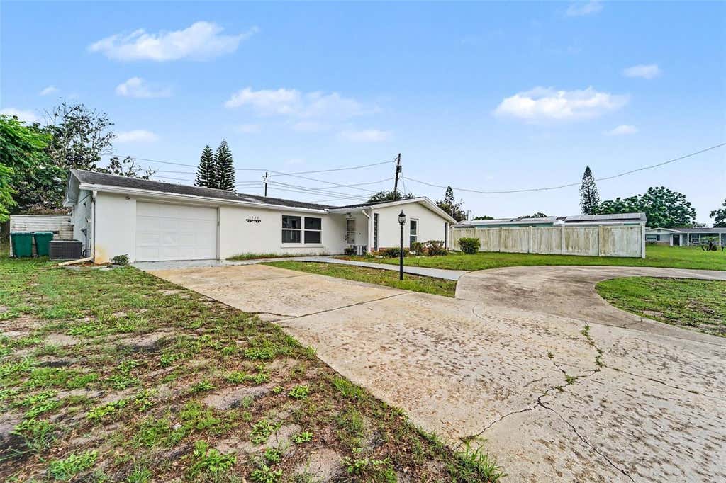 Photo of 3536 Kimberly Oaks Drive, Holiday, FL 34691 (MLS # TB8536683)