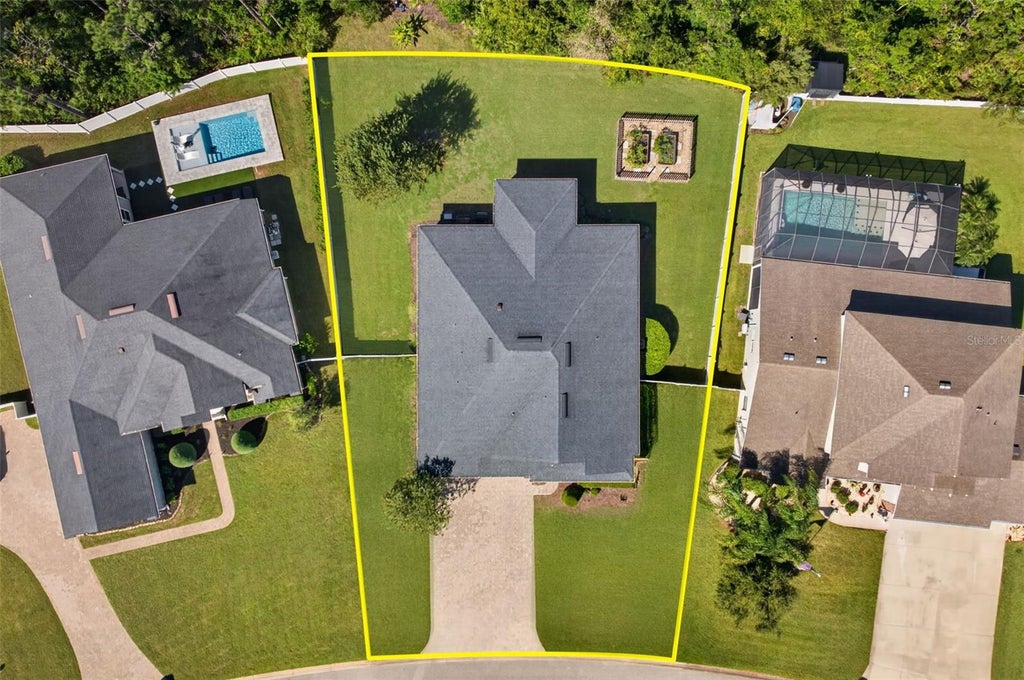 Photo of 53 Ashford Lakes Drive, Ormond Beach, FL 32174 (MLS # V4952033)