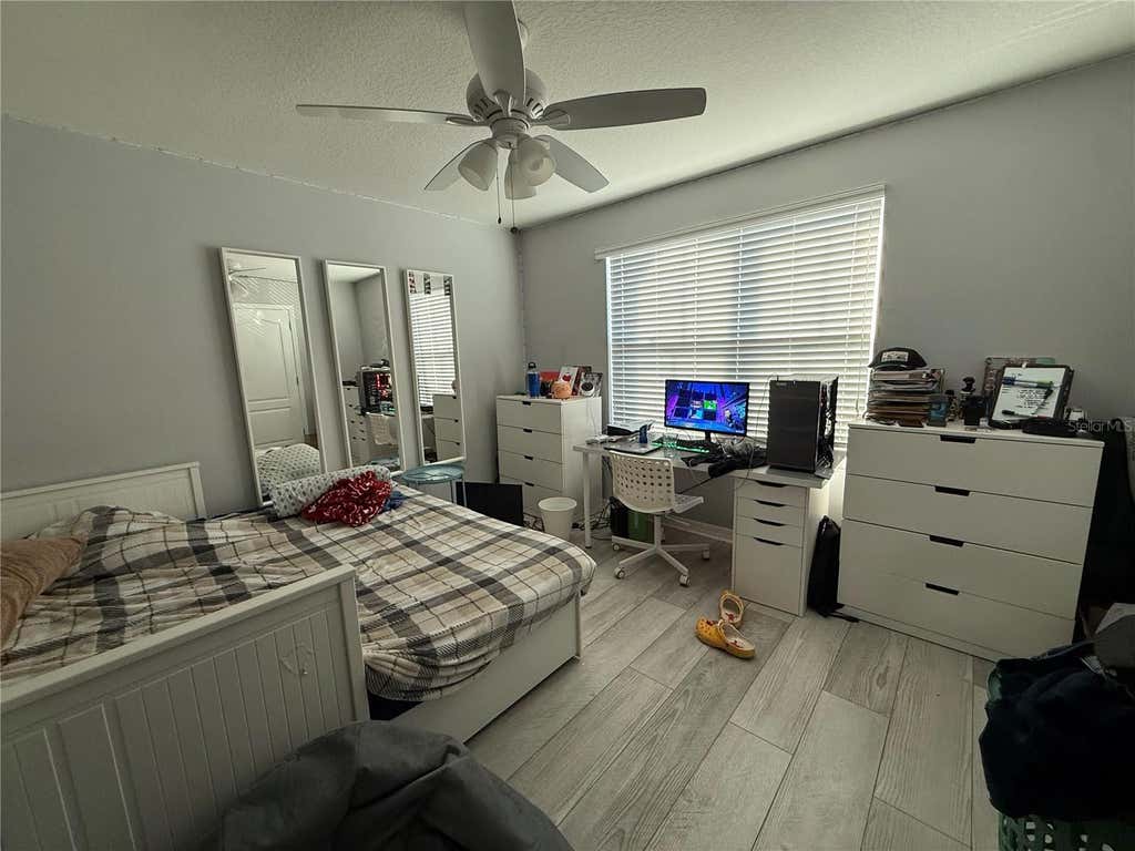 Photo of 1874 Hickory Bluff Road, Kissimmee, FL 34744 (MLS # O6398896)