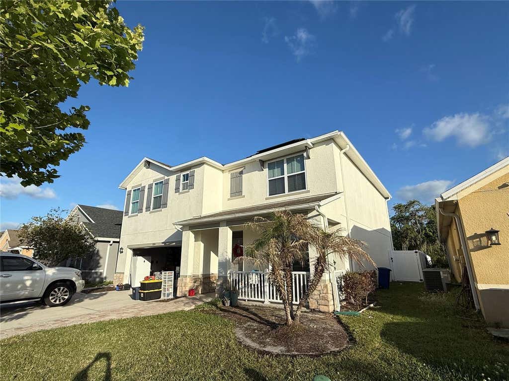 Photo of 1874 Hickory Bluff Road, Kissimmee, FL 34744 (MLS # O6398896)