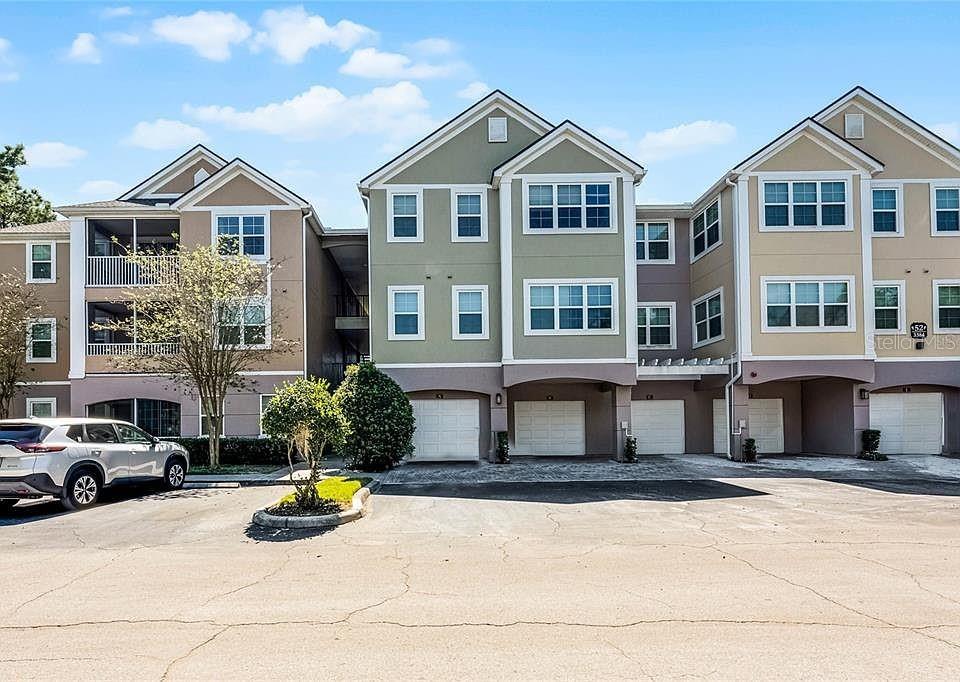 Photo of 3384 Corona Village Way #202, Orlando, FL 32835 (MLS # O6453257)