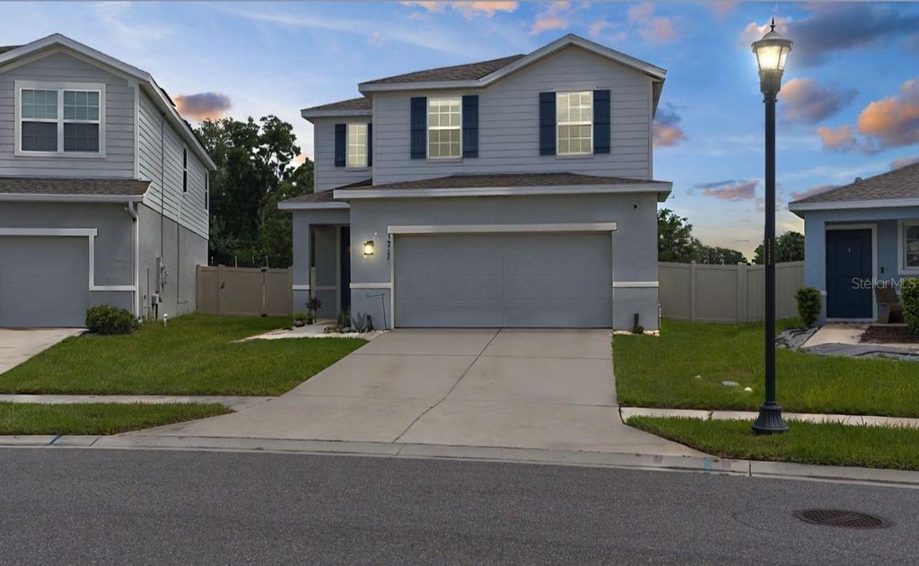 Photo of 10767 Old Sycamore Loop, Land O Lakes, FL 34638 (MLS # W7878682)